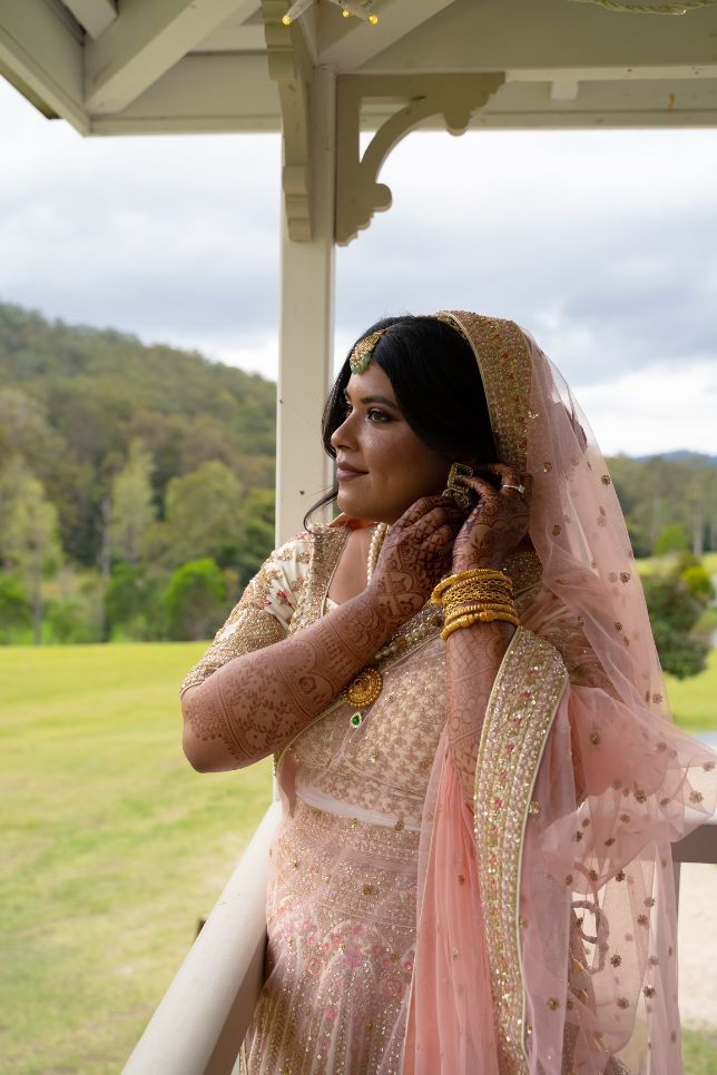 Gold Coast bride wears traditional Bangladeshi wedding clothes