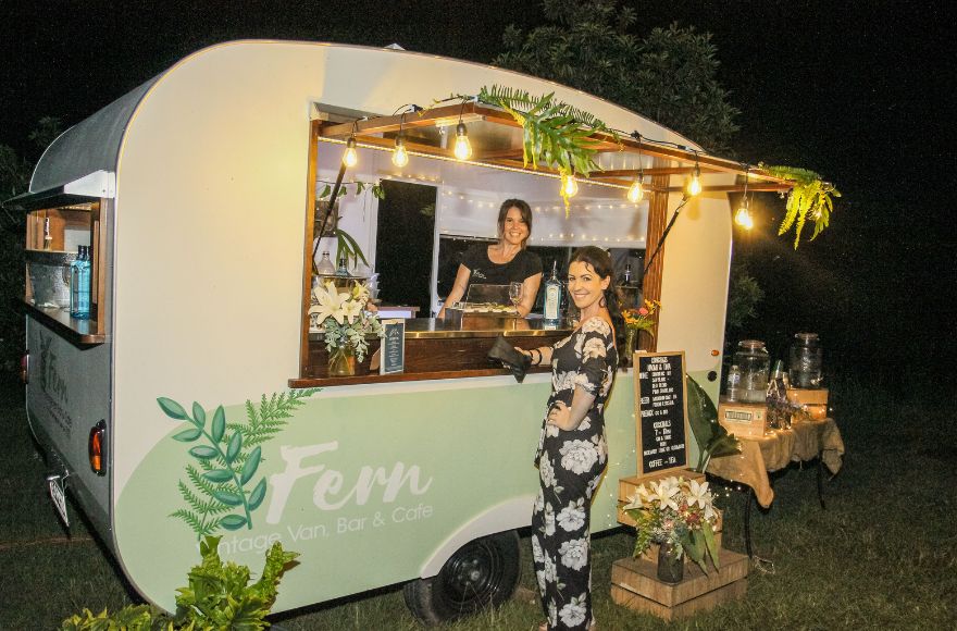 Street food truck serves drinks and snacks at wedding reception