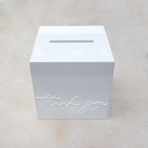 White cube enclosed wishingwell with thankyou written on it
