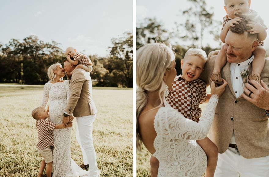 Newly wed husband and wife embrace their little children after the ceremony
