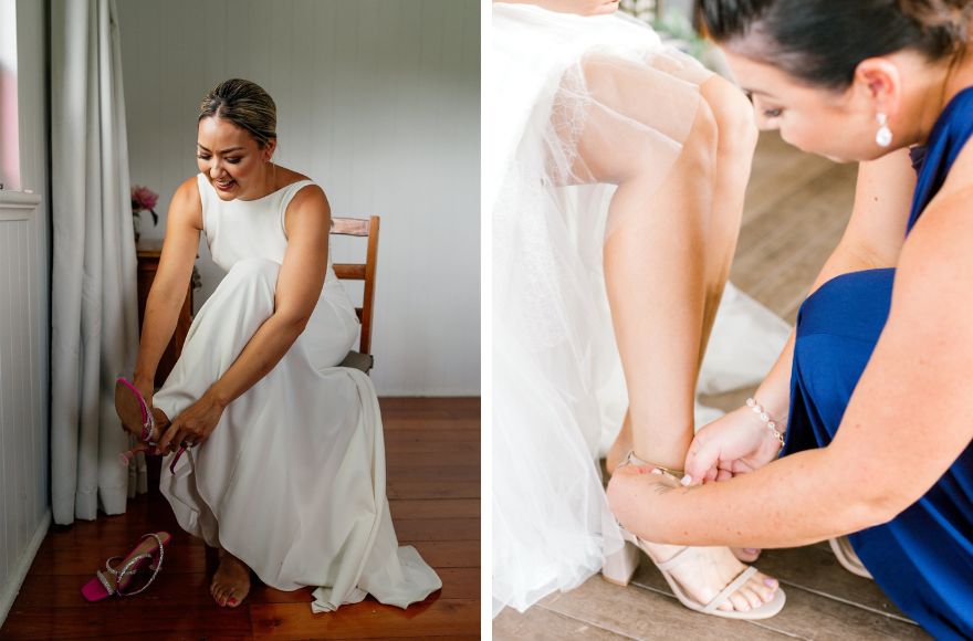 Brides fit their wedding shoes. One wears a hot pink pair and the other a neutral tone. 