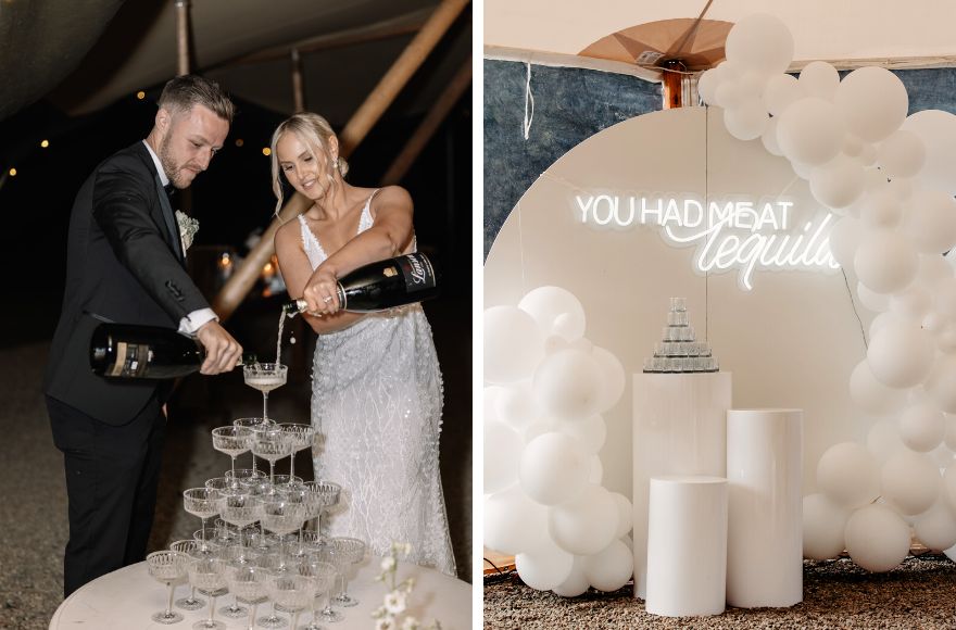 Bride and groom pour champagne into a tower of champagne coupes. 