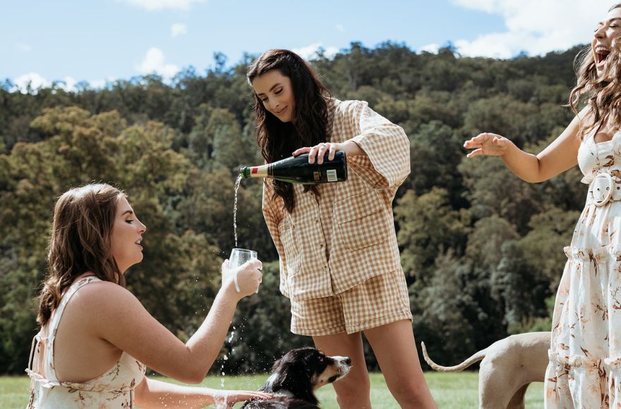 3 women drink champagne in the Gold Coast hinterland 