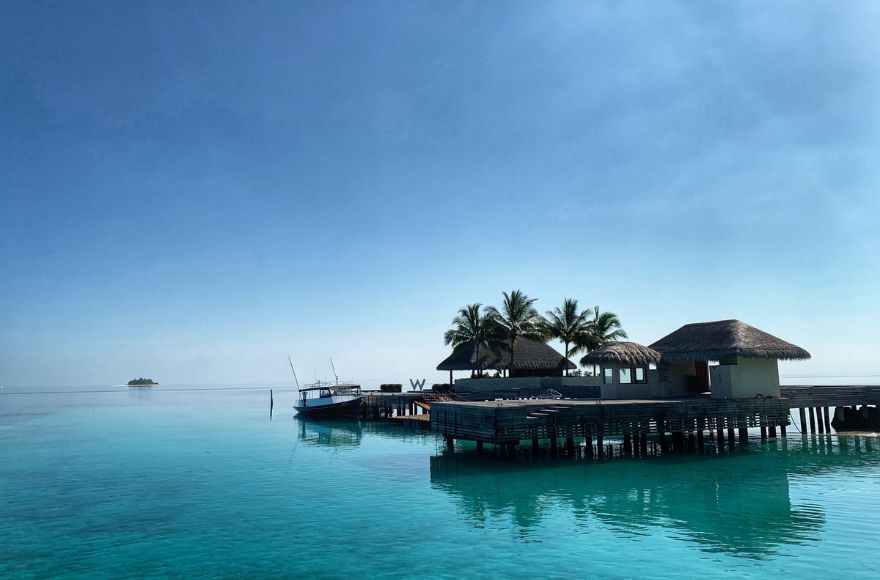 Overwater bungalows on an island 